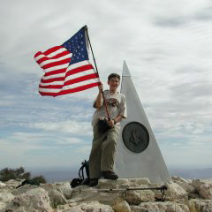 Flying the Flag atop Guadalupe Peak